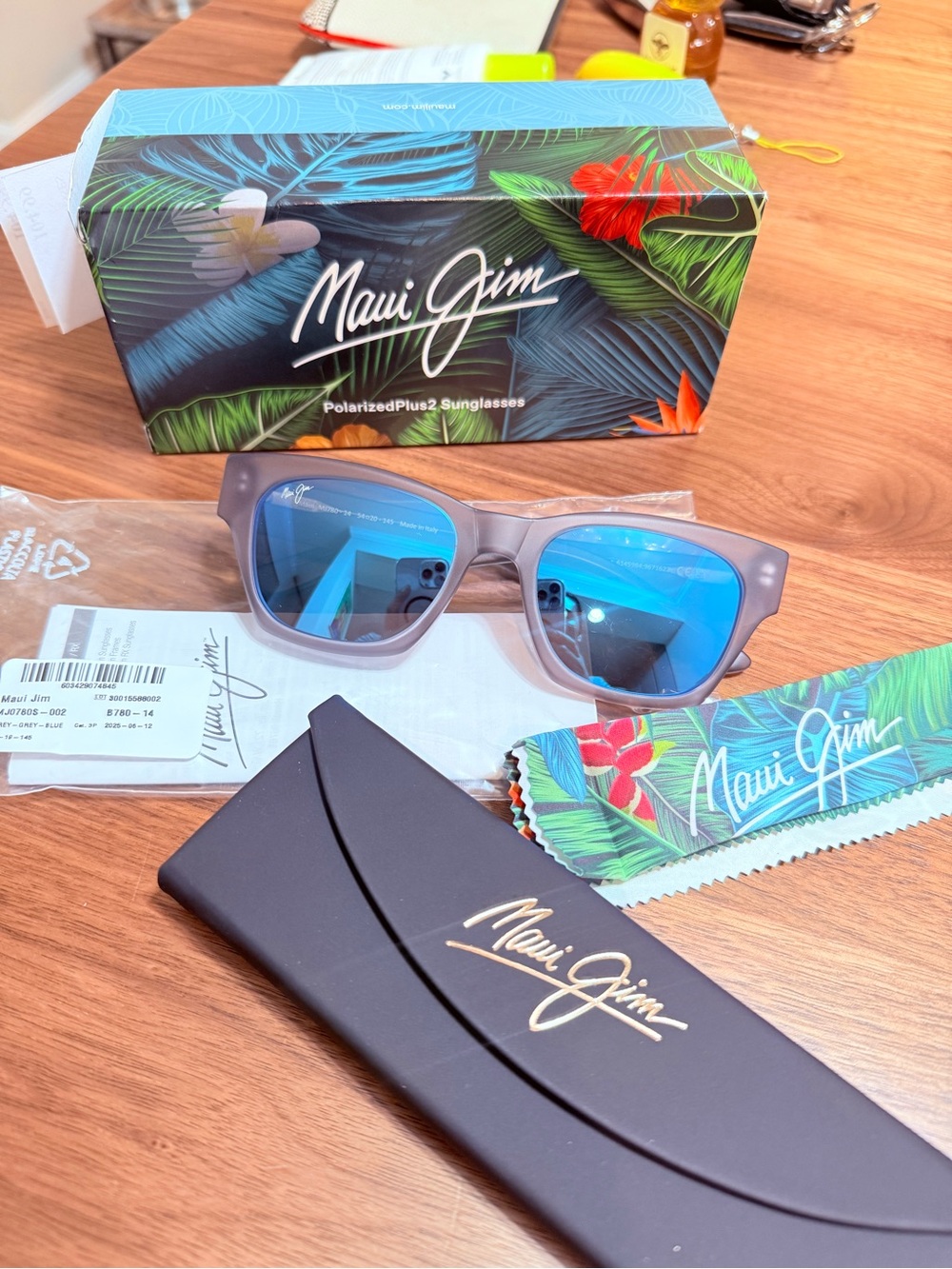 Maui Jim Sunglasses with Blue Lenses and Translucent Gray Frame